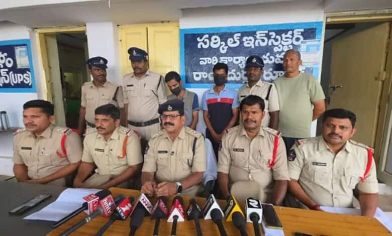 Andhra Police officers and suspects during a press conference about a murder case.