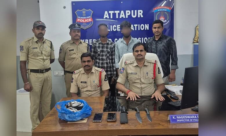 Police officers and suspects in a police station in Attapur, India.