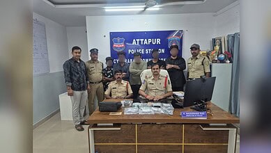 Attapur police officials and suspects during a drug bust at the police station.