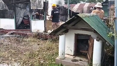 A firefighter in action amid violence in Manipur