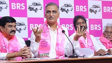 Telangana politician Harish Rao speaking at a press conference with BRS banners in the background.