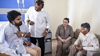 Pawan Kalyan in hospital with medical team and visitors after shoulder surgery.