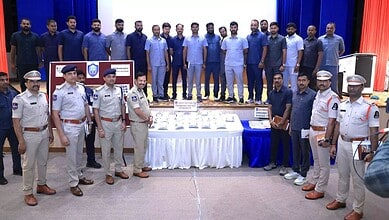 Police officers and suspects during a drug bust event in Hyderabad, India.