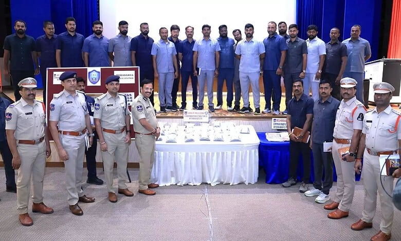 Police officers and suspects during a drug bust event in Hyderabad, India.