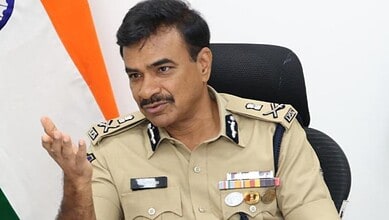 Telangana DGP Anand in uniform speaking during a meeting or press conference.