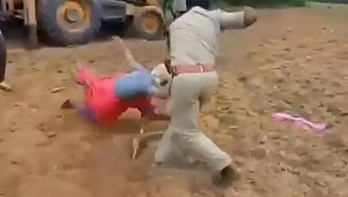 Forest official attacking tribal woman in Bhadradri Kothagudem, India.