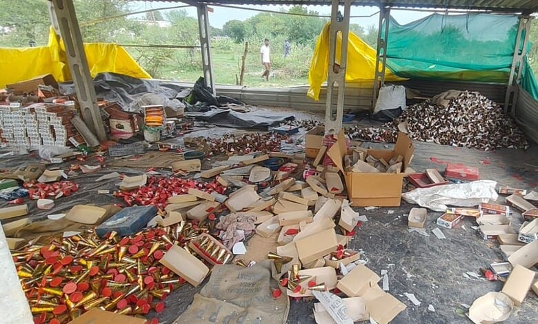 Explosion site with scattered firecrackers and debris after blast at illegal firecracker unit.