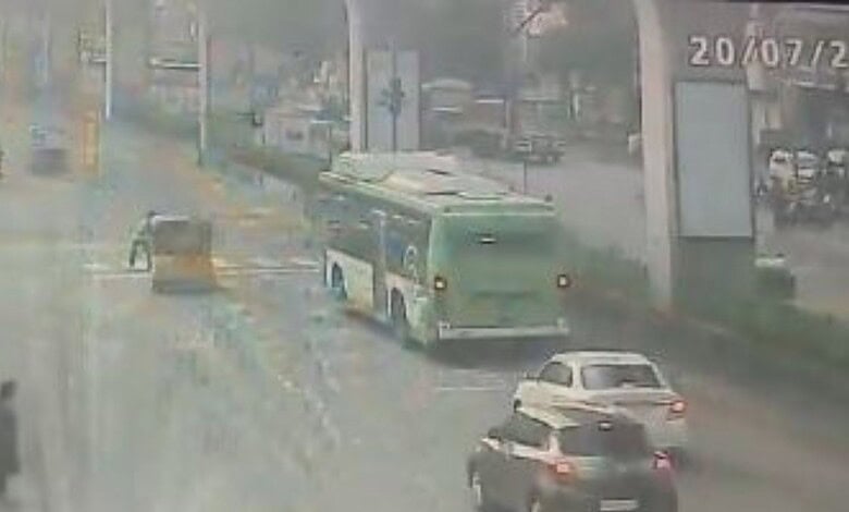 Bus and cars involved in a traffic incident on a rainy day in Kukatpally.