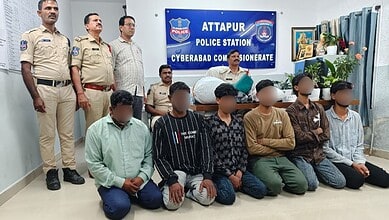 Six suspects detained by Attapur police in drug racket bust, with officers at police station.