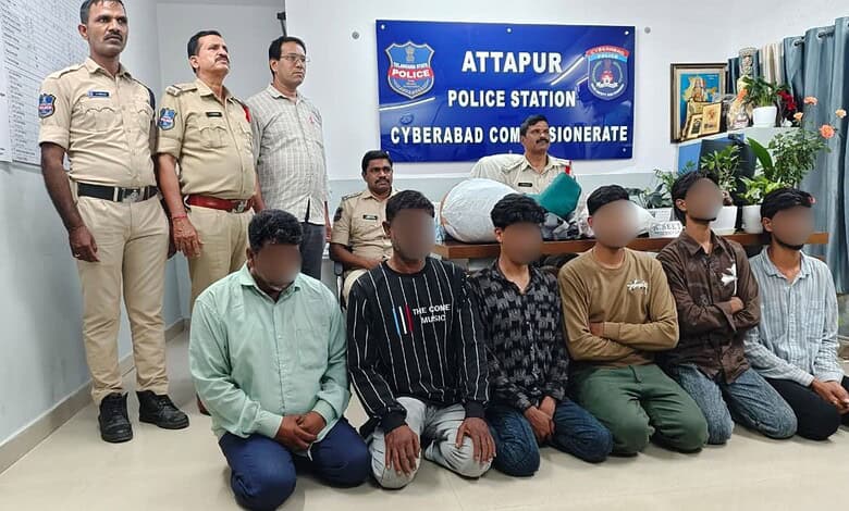 Six suspects detained by Attapur police in drug racket bust, with officers at police station.