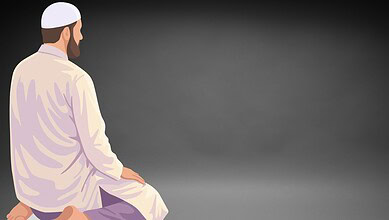 A man in traditional Islamic attire sitting in prayer, facing away from the camera.