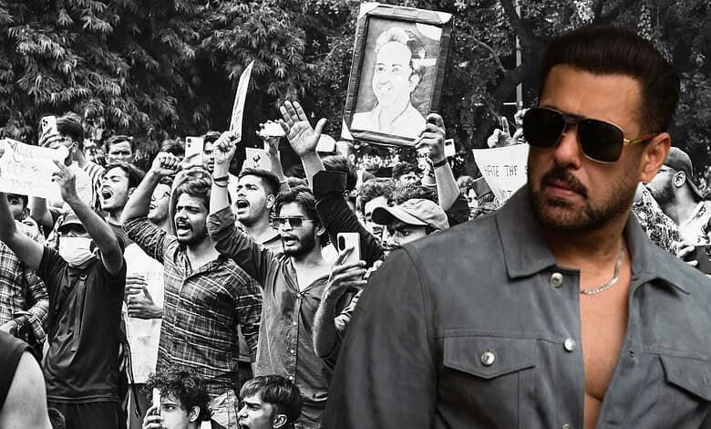 Salman Khan at a public event with a crowd of fans in the background.
