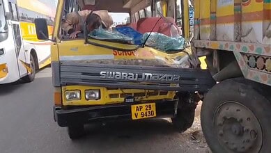 The driver checks the bus after ramming a lorry in Medchal