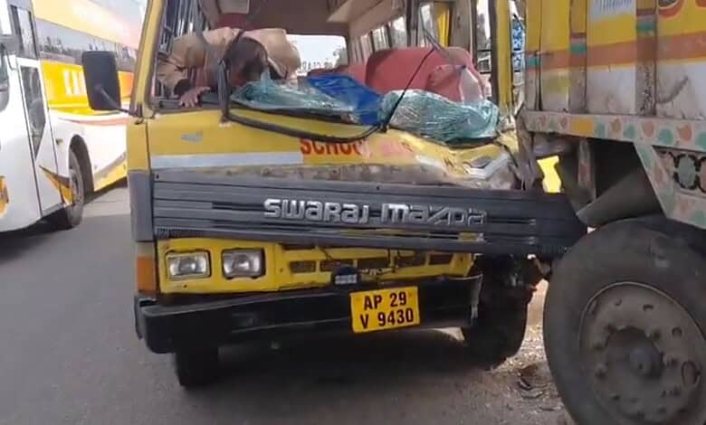 The driver checks the bus after ramming a lorry in Medchal