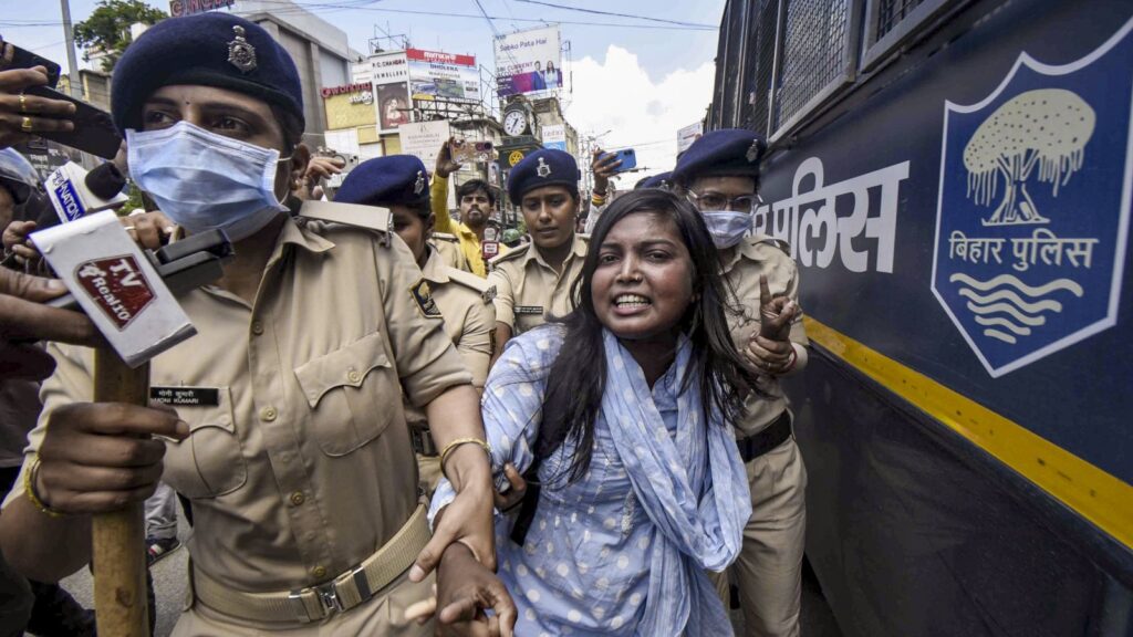Bihar police clash during bandh over NEET paper leak, woman protests with police in Siwan.