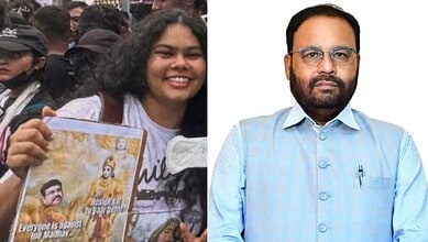 Young woman protesting with a poster, Assam CM on her right, both facing forward.
