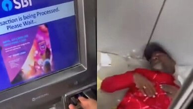 A man sleeps inside an ATM in Hyderabad