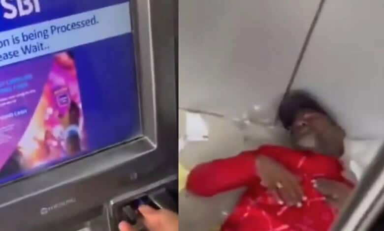 A man sleeps inside an ATM in Hyderabad