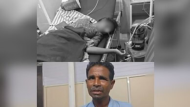 Young man lying in hospital bed connected to medical equipment, receiving treatment.