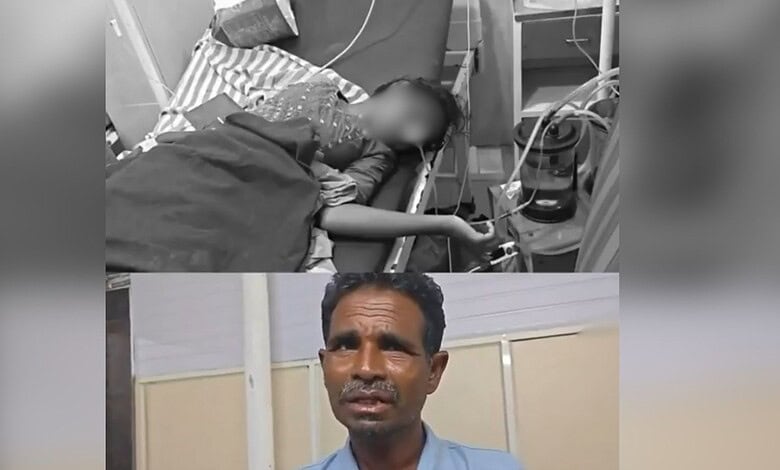 Young man lying in hospital bed connected to medical equipment, receiving treatment.