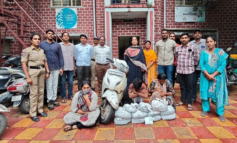 Police and officials display seized 9 kg ganja in Hyderabad with suspects and evidence.