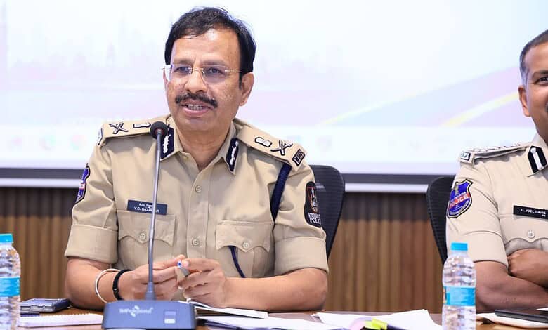 Hyderabad police official speaking at a safety meeting with fire safety measures discussed.