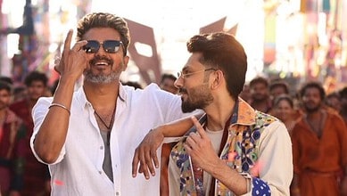 Anirudh Ravichander and Thalapathy Vijay smiling and enjoying a public event.