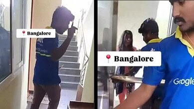 Delivery agent in blue uniform entering a Bengaluru home, police investigation ongoing.