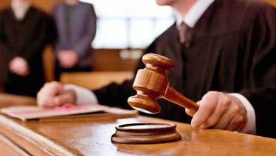 Judge's gavel in court, symbolising legal proceedings and justice.