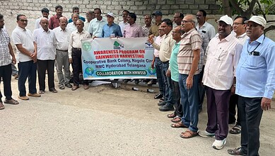 Community members participate in rainwater harvesting awareness program in Hyderabad.