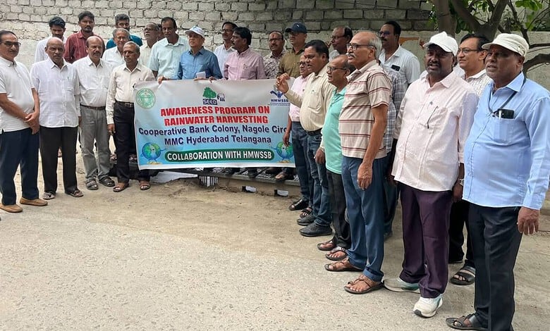 Community members participate in rainwater harvesting awareness program in Hyderabad.