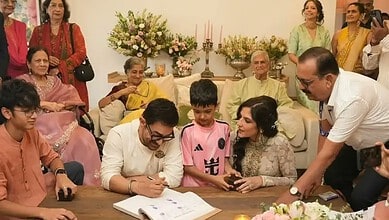 Aamir Khan's family and friends gather around him during his wedding celebration with Gauri Spratt.