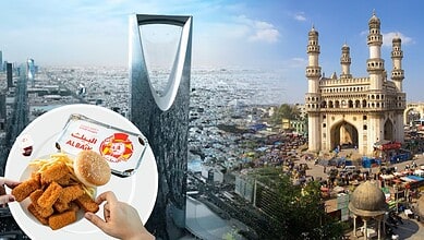 View of Hyderabad city with the ALBAIK fried chicken meal in the foreground.
