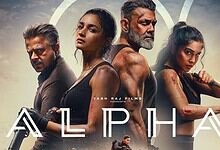 Group of four intense characters from the film Alpha, with a dramatic sky background.