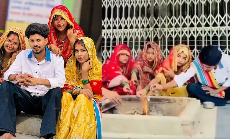 Group of people in traditional Indian wedding attire participating in a wedding ritual.