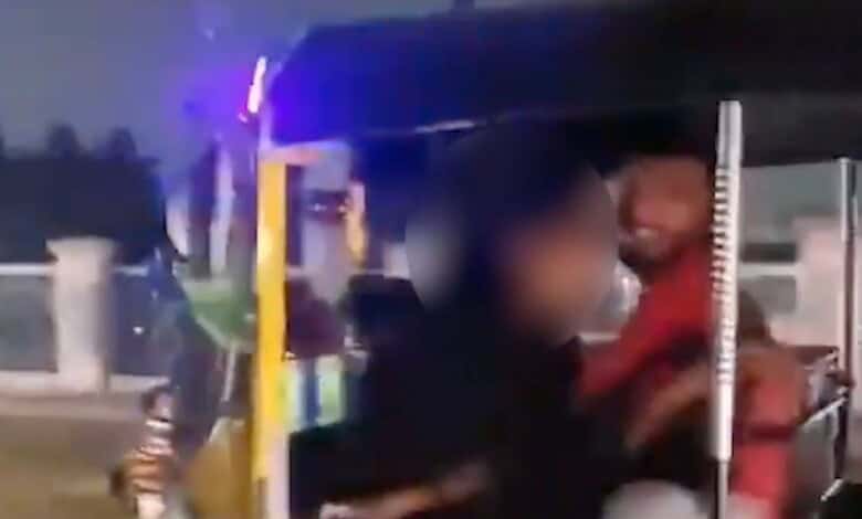 Juvenile auto driver with woman in Chaderghat
