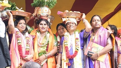 Women participating in Golconda Bonalu 2026 with traditional attire and decorated pots on their heads.