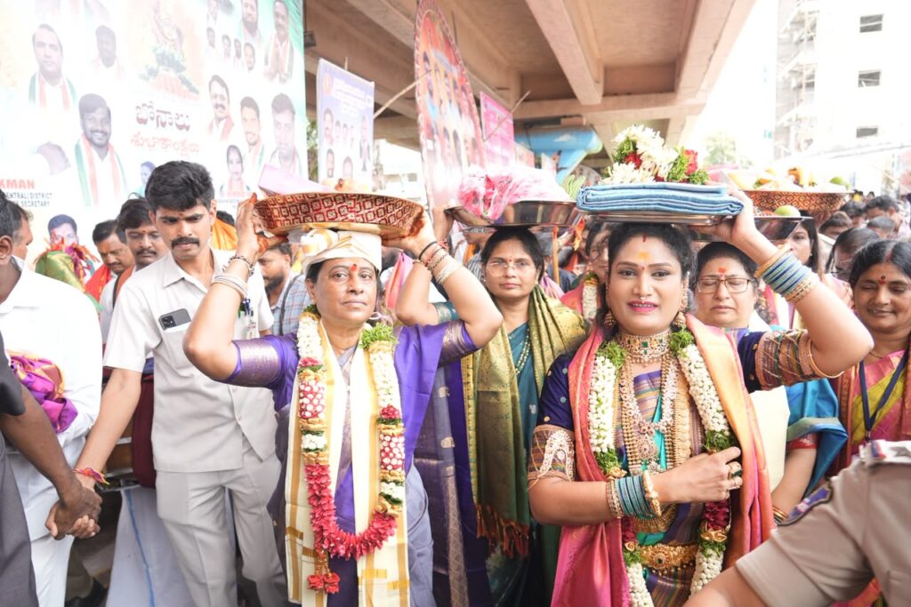 Women participating in Golconda Bonalu 2026 festival, carrying offerings on their heads during the event.