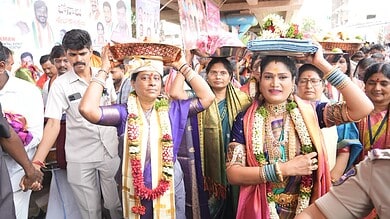 Women participating in Golconda Bonalu 2026 festival, carrying offerings on their heads during the event.