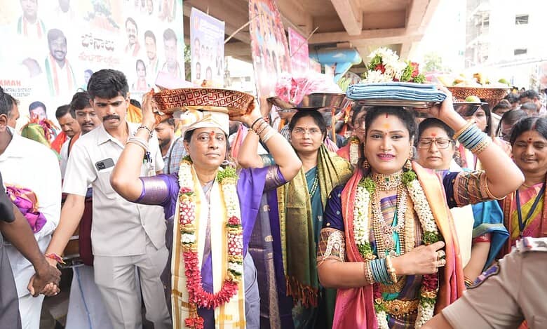 Women participating in Golconda Bonalu 2026 festival, carrying offerings on their heads during the event.