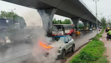 Moving car catches fire under PVNR Expressway in Hyderabad