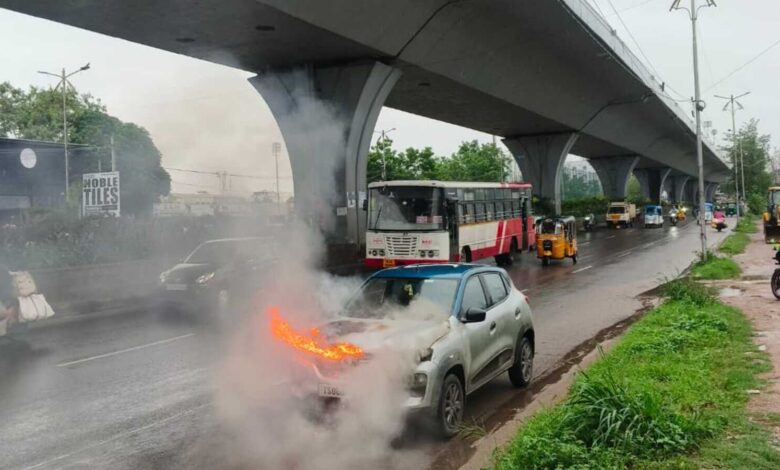 Moving car catches fire under PVNR Expressway in Hyderabad