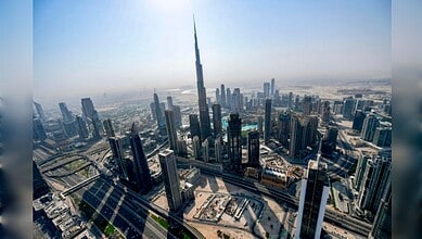 Dubai skyline with the Burj Khalifa and surrounding skyscrapers.