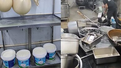 Kitchen with dirty utensils and containers, linked to food safety concerns.