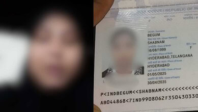 Blurry image of a woman holding her ID card from Hyderabad, Telangana, India.