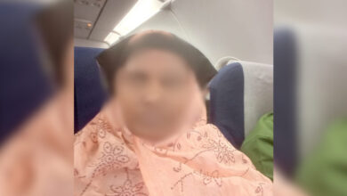 Blurred face of Hyderabad woman Shaheen Shaik seated inside an aircraft during her journey to Oman.
