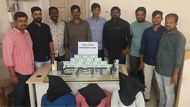 Group of men with seized Mephentermine injections on table during a police operation.