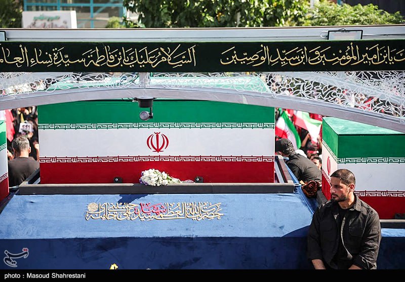 The flag-draped coffin of Ayatollah Seyyed Ali Khamenei on a ceremonial vehicle during the funeral procession in Tehran.