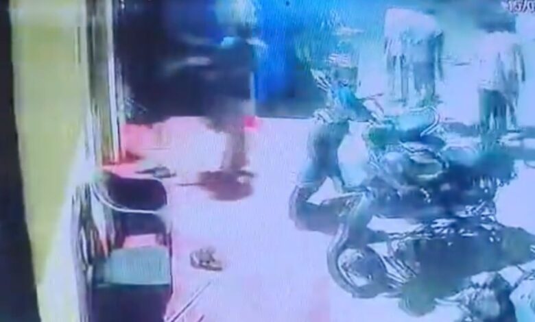Scene of a violent clash with injured individuals and damaged property in Hyderabad's Meerpet.