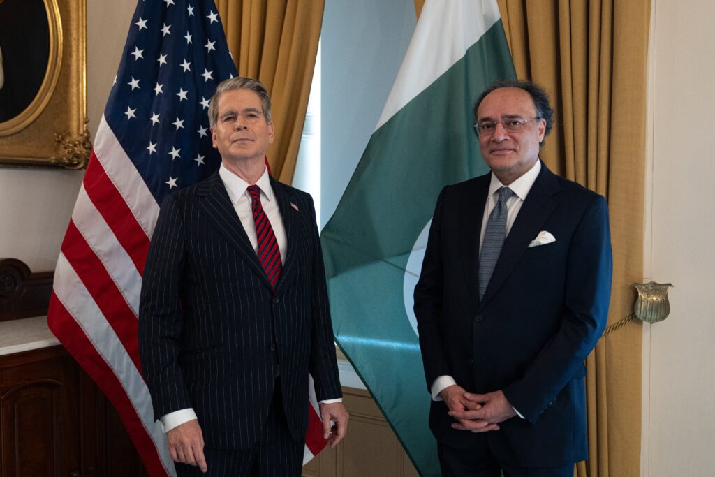 Pakistan Finance Minister Mohammed Aurangzeb and US Treasury Secretary Scott Bessent pose for a photograph during a meeting in Washington.
